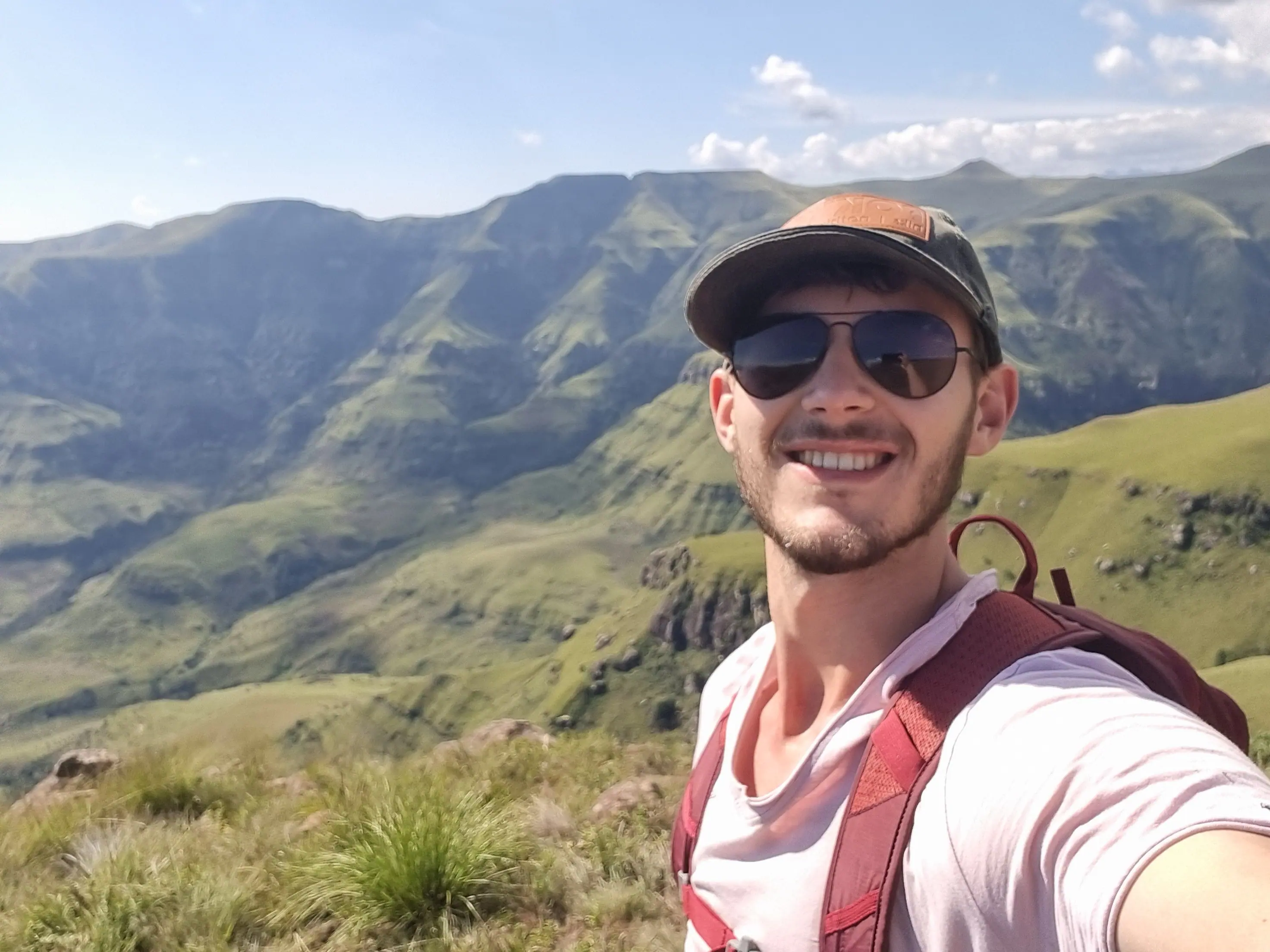 Derik Korf hiking outdoors, showing his adventurous side when not coding